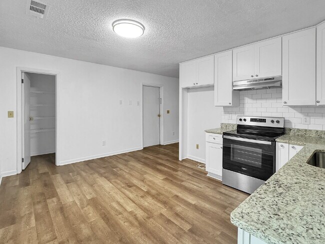 Photo - Charming 3-Bedroom Brick Ranch with Large ...