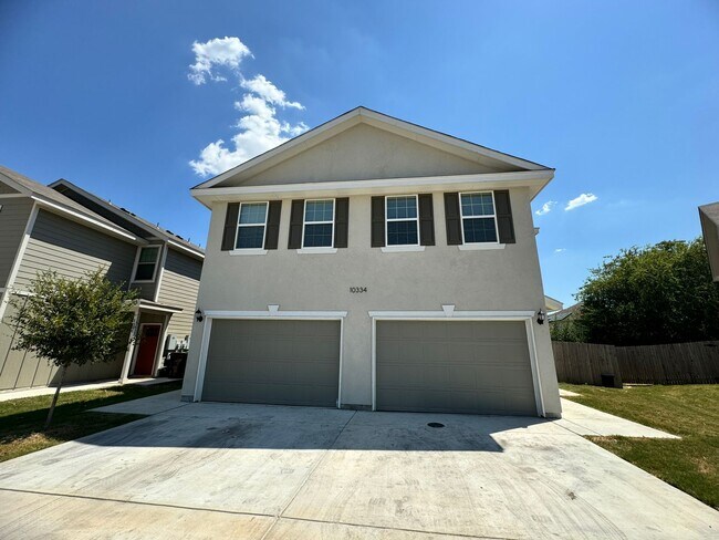 Building Photo - Move Fast! Gated Townhome Near Lackland AFB with Private Yard & EV-Ready Garage