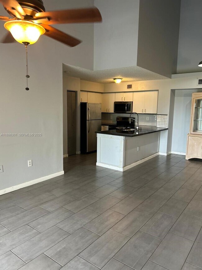 Building Photo - 1755 Village Blvd Unit 303