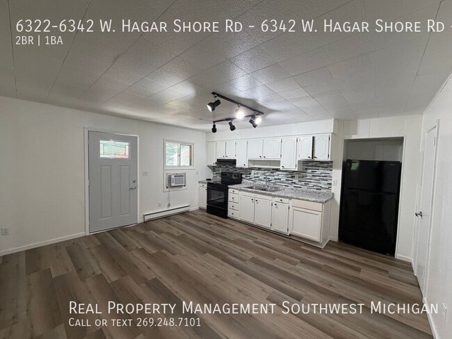 Building Photo - 6322-6342 W. Hagar Shore Rd - 6342 W. Hagar Shore Rd-Unit 3 Unit 3