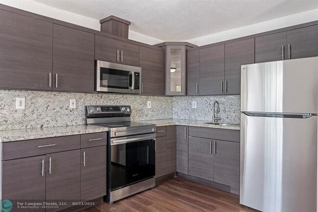 Building Photo - 323 NW 97th St Unit 323 Rental