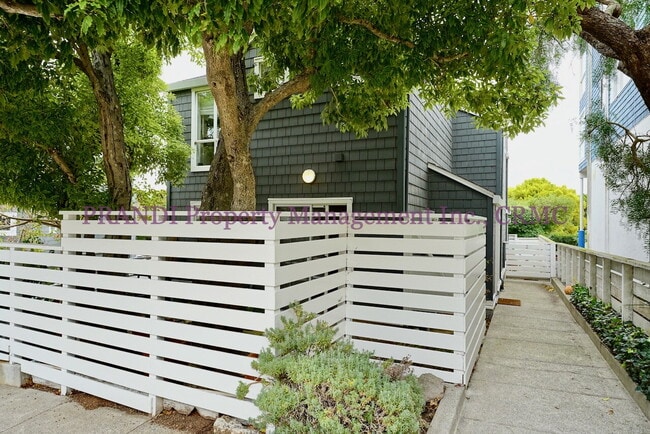 Photo - Wood burning fireplace in this updated 2 b... Unit Apt 2