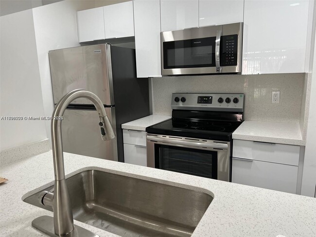 Photo - 6540 W 27th Ct Condo Unit 14-56
