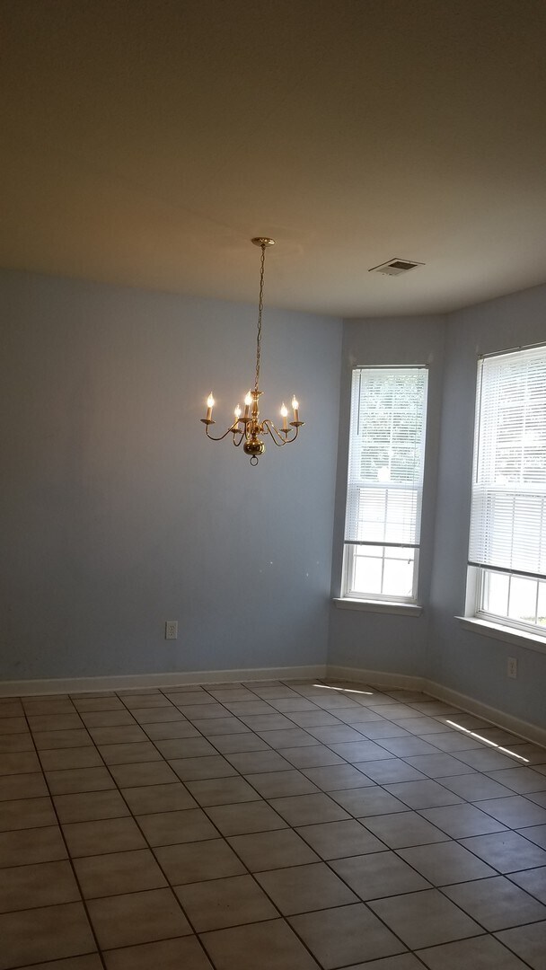 Photo - Lovely 4 BR/2.5 BA in Avalon - FRESH paint, BRAND NEW flooring, FOUR bedrooms and a FENCED yard!!