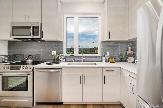 Building Photo - 9268 50th Ave S Unit C