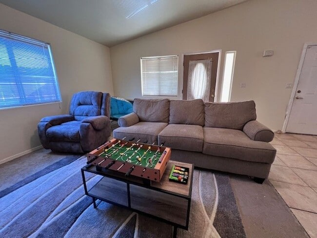 Photo - 3 Br 2Ba House with Garage and fenced yard**FURNISHED**