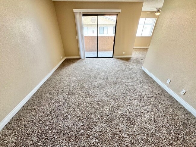 Photo - THIS SECOND-FLOOR DESERT SHORES CONDO OFFE...