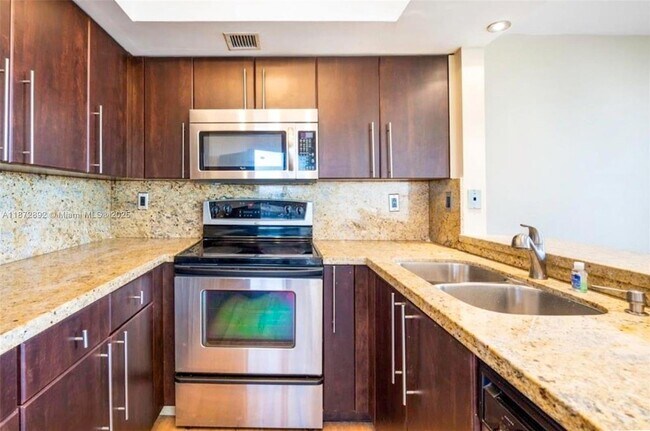 Building Photo - 8215 SW 152nd Ave Unit G-411 Rental