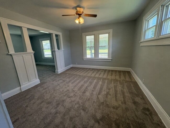 Photo - Comfortable Akron Home with Covered Front Porch, Dining Room & 2-Car Garage