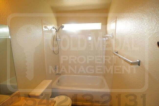 Photo - Cozy 3-bed, 2-bath fourplex now available for rent! - Don't miss out!