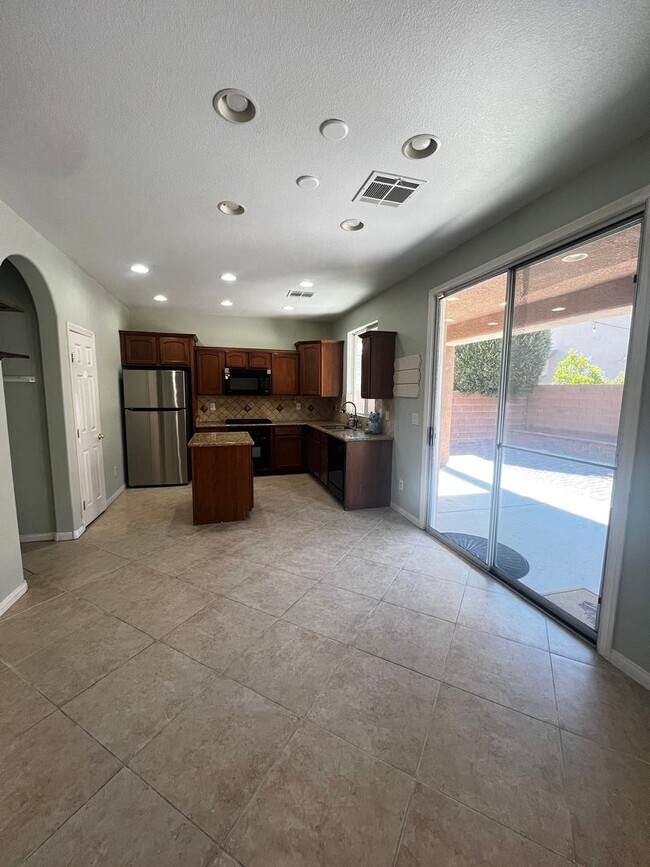 Photo - Spacious 4-Bedroom Mountains Edge Home with Downstairs Suite, Balcony & Covered Patio