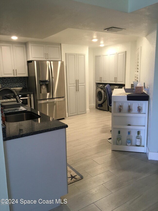 Photo - 3613 S Banana River Blvd Unidad 304