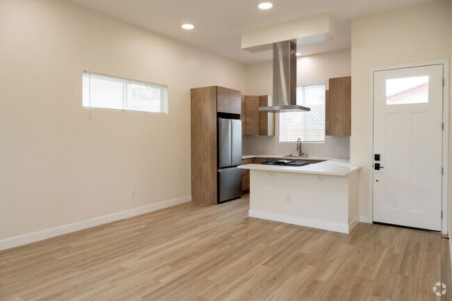 View of kitchen and front door - 4772 Bancroft St Unit One Bedroom Rental