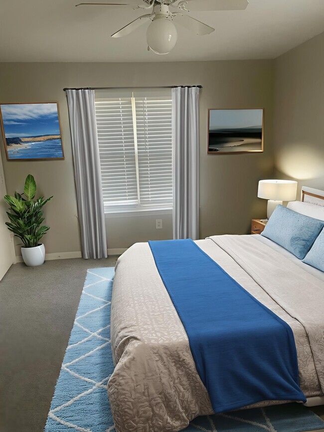 Unwind in the serene surroundings of Riverwood Park Apartments, where comfort meets style. This elegant bedroom combines modern design with tranquil vibes, perfect for relaxation. Schedule a tour today and see it for yourself!