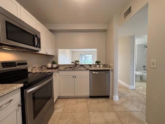 Building Photo - 6748 Palmetto Cir S Unit 1040 Rental