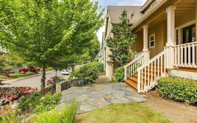 Photo - Spacious Four-Bedroom Home with Gourmet Kitchen, Multiple Living Areas, Loft, and Beautifully Lan...