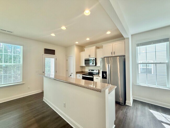 Photo - Spacious 3BD, 2.5BA End Unit Raleigh Townhome Near White Oak Shopping Center, I-40, and Downtown ...