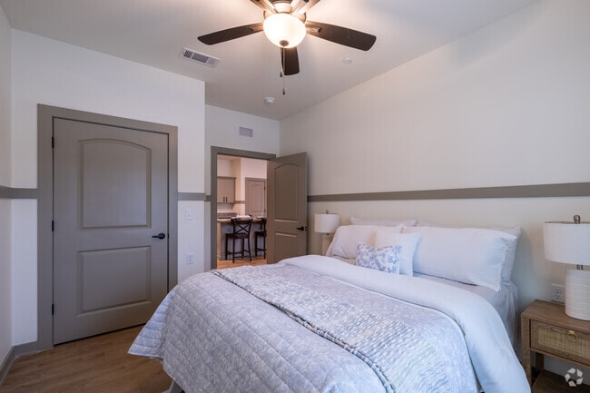 2BR, 1BA - 928SF - Primary Bedroom - Capstone at the Oaks - 55+ Community