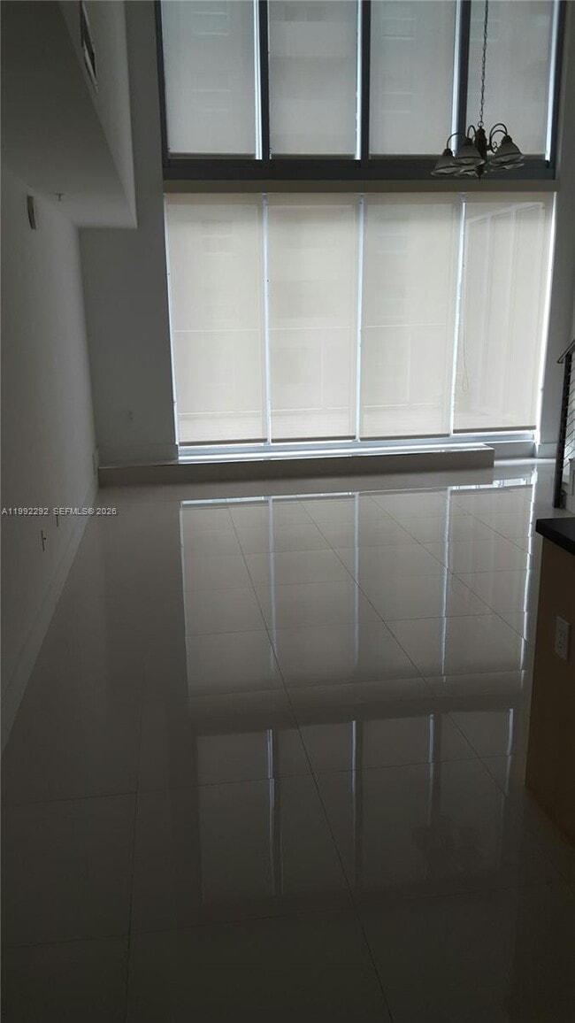 Building Photo - 1111 SW 1st Ave Unit TH-20