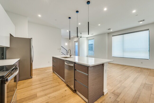 Photo - Live Above It All | Sleek Multi-Level Condo with Private Rooftop Deck