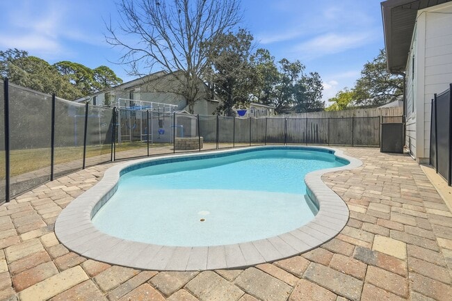 Photo - Stunning 4 Bedroom Home with Solar Energy & Private Pool!
