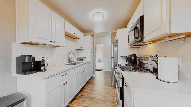 Building Photo - 4591 Orange Ave Unit 103