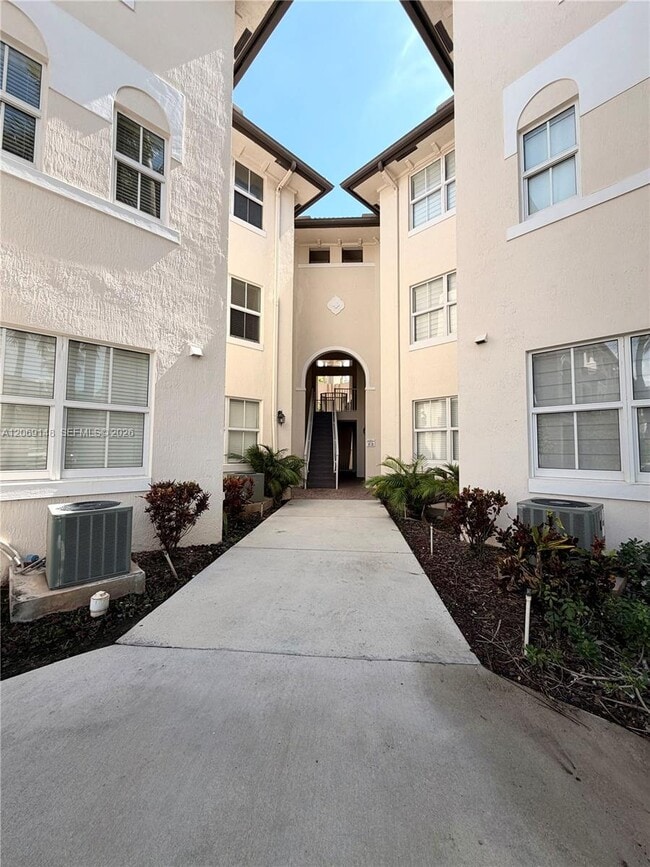 Building Photo - 11603 NW 89th St Unit 109