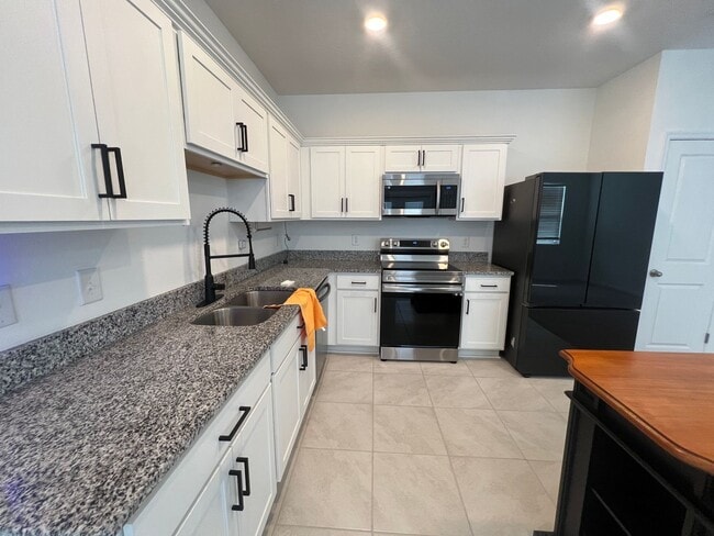Photo - Modern 3-Bed Townhome w/ Garage in Desirable Davenport Community