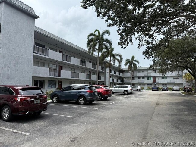 Building Photo - 8405 NW 61st St Unit D315