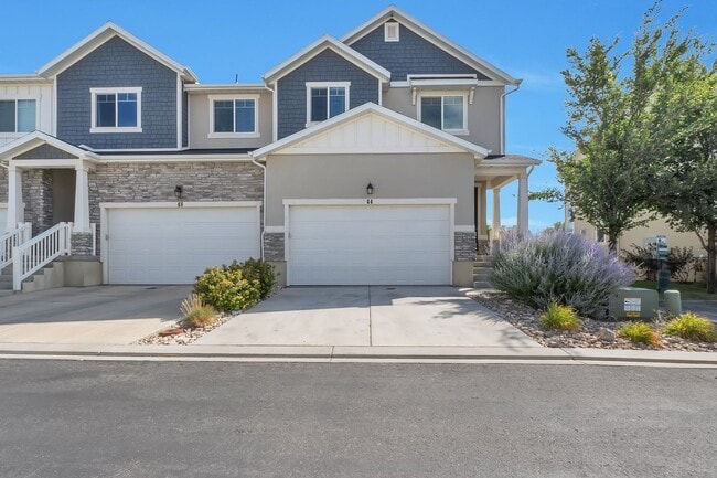 Building Photo - Modern Row End Townhome w 2 car attached g...