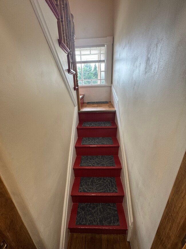 Entry stairs & window - 13 Pleasant Pl Unit 3