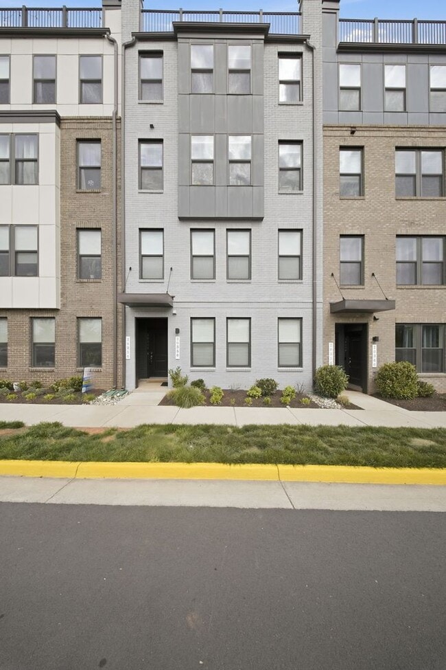 Photo - Perfectly positioned near the vibrant shopping and dining destination of One Loudoun, this reside...