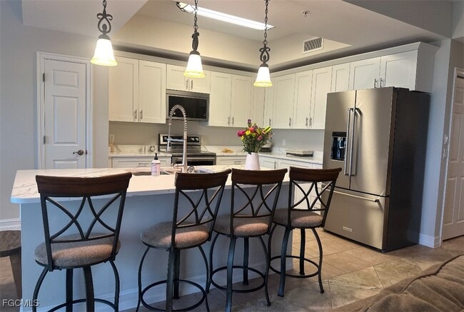 Building Photo - 10800 Palazzo Wy Unit 202