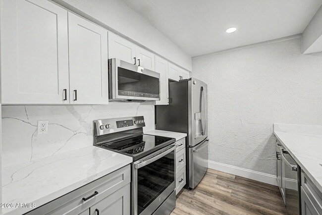 Building Photo - 3314 N 68th St Unit 211