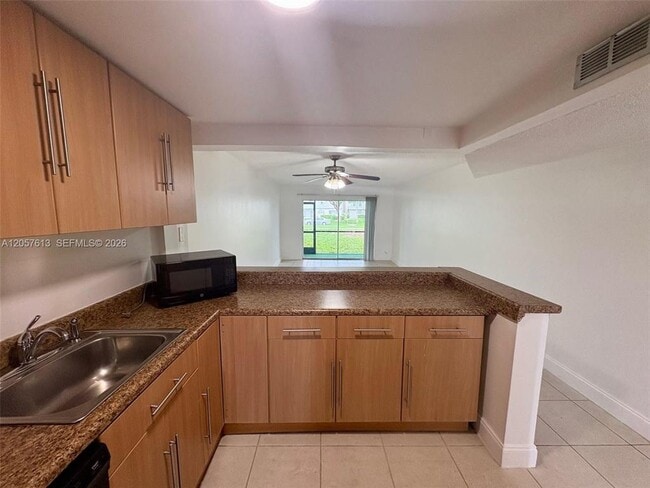 Building Photo - 8060 Colony Cir N Unit 107