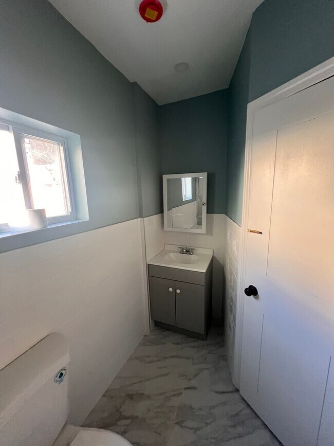 Photo - 144-19 101st Ave Unit 1 - West