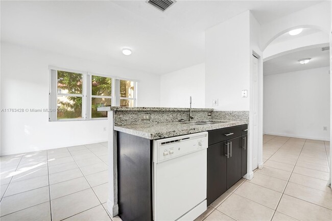 Photo - 1555 NE 33rd Rd Townhome