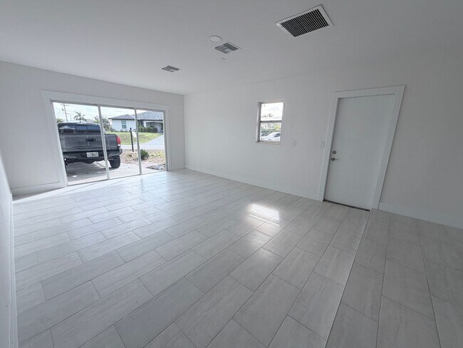 Photo - SECTION 8!!! 3/2 pool home with 2 BONUS ROOMS AVAILABLE 09/01/2026