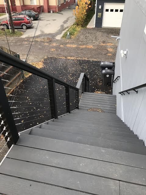 stairs leading to apartment and parking space - 343 W 12th Ave Unit 1