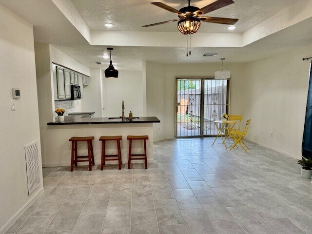 Building Photo - 12215 W Village Dr Unit D Rental