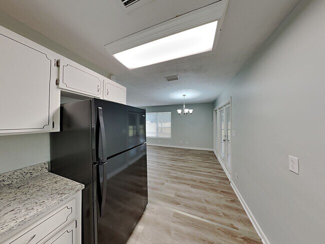 Photo - Updated 3 Bed, 2 Bath Home with Fenced Yard & Sunroom in Jacksonville, FL