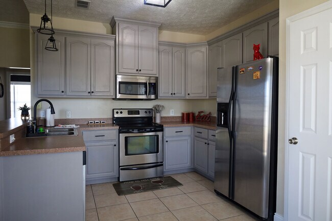 Kitchen w/ stainless steel appliances
