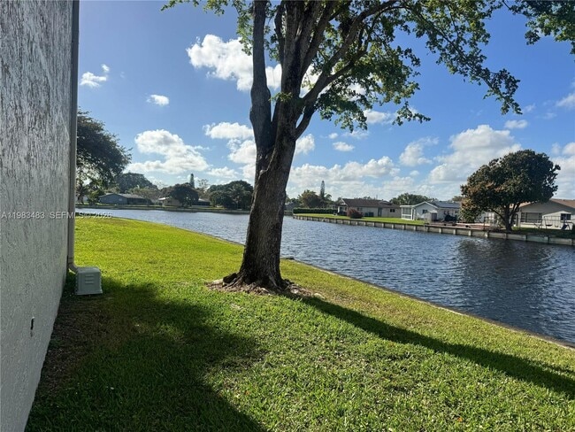 Building Photo - 9400 Lime Bay Blvd Unit 206