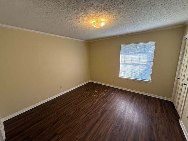 Photo - Freshly painted unit. Positioned along Navco Road, the home offers convenient access to major rou...