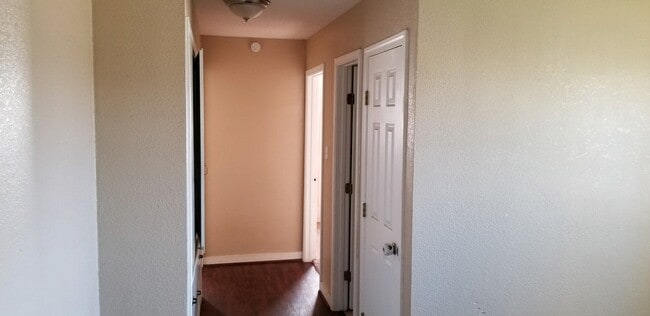 Hallway into the bedrooms - 803 W 10th St