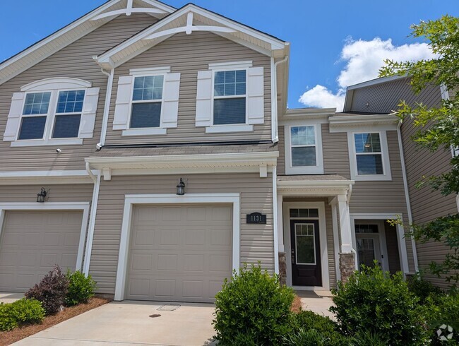 Building Photo - Elegant, Move In ready townhome located in...