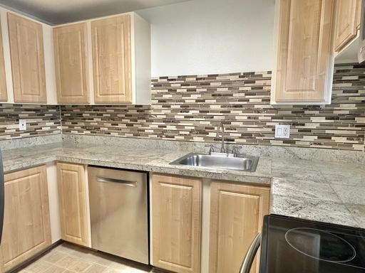 Photo - New Price! Convenient 1 bed condo is desir... Unit H228
