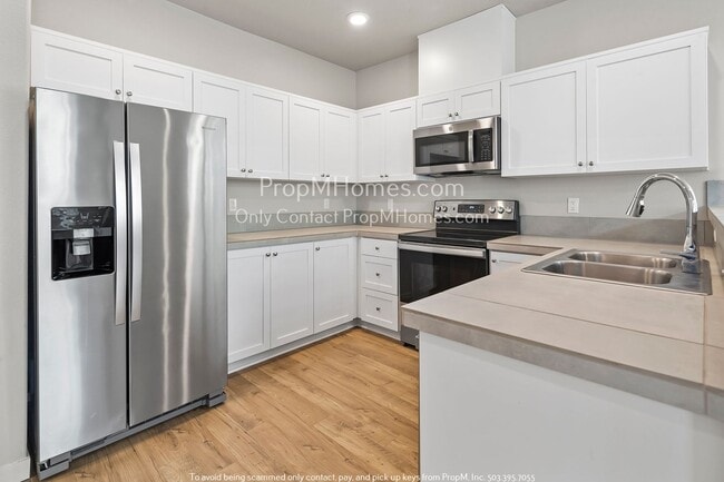 Photo - Charming One-Bedroom Condo in the Heart of Bull Mountain - Pool & Gym Access Included!
