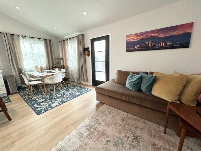 Living space and dining room table - 4415 Catalpa St