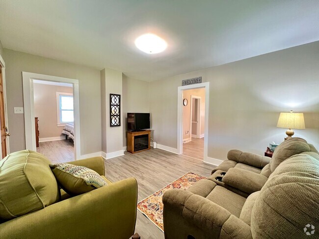 Building Photo - This adorable fully furnished 2 bedroom/1 ... Rental